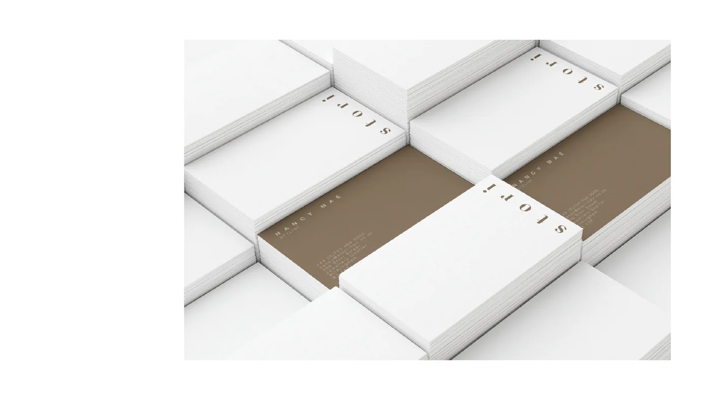 Business cards in bronze and white